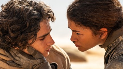 Chani holds Paul's face as they look into each others' eyes in Dune: Part Two.